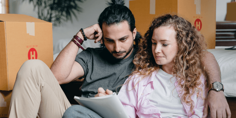 A couple looking at a piece of paper
